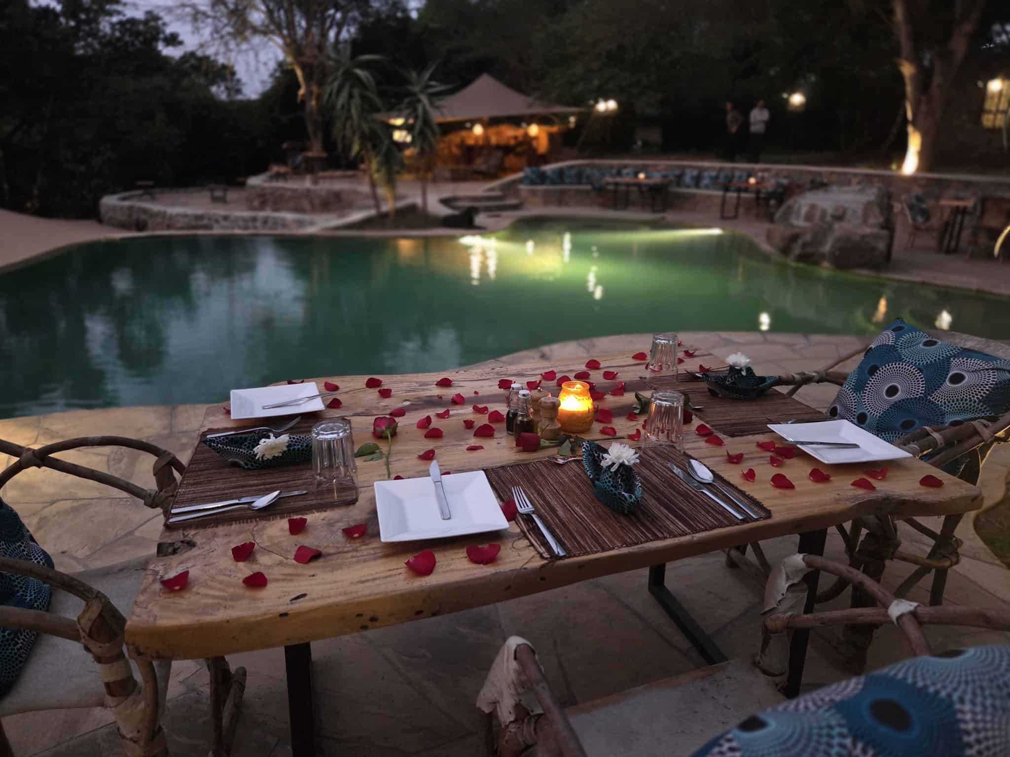 Candlelit dinner beside the pool at Dolly Escape, Usa River, Tanzania